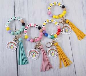 Four Silicone Beaded Teach Wristlet Keychain with Tassel and Rainbow Charm